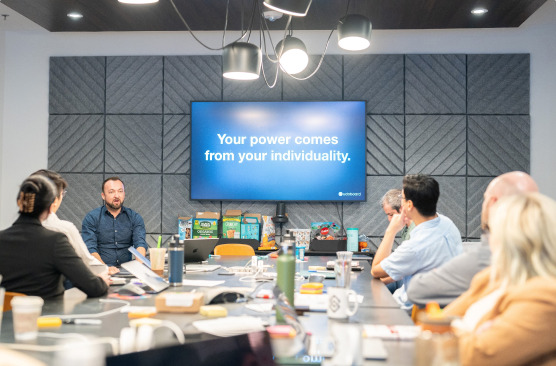 Group of employees in meeting room